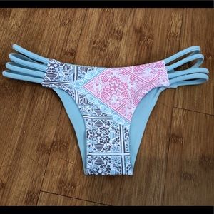 Reversible cheeky San Lorenzo bottoms